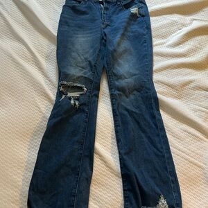Women's Distressed Blue Jeans